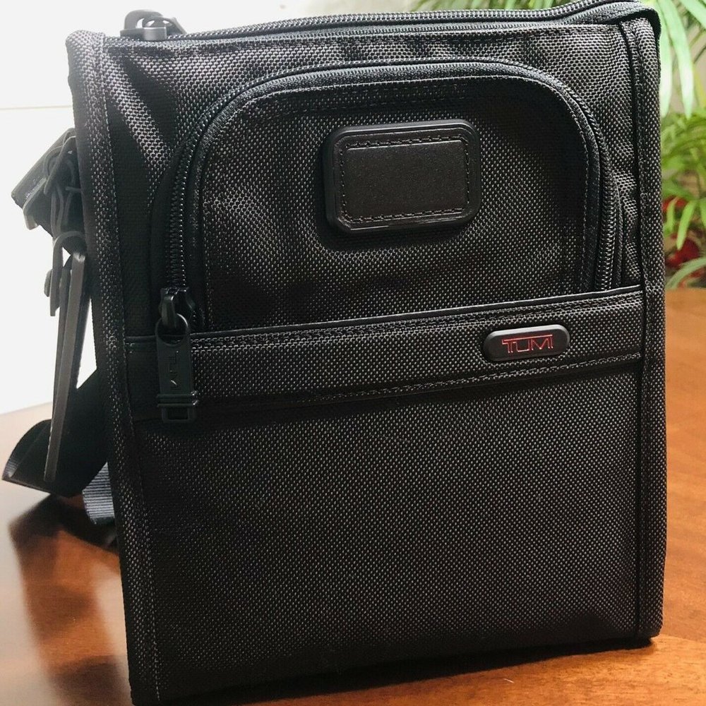 Brand New with Tag Tumi Pocket Bag Small Crossbody in Black